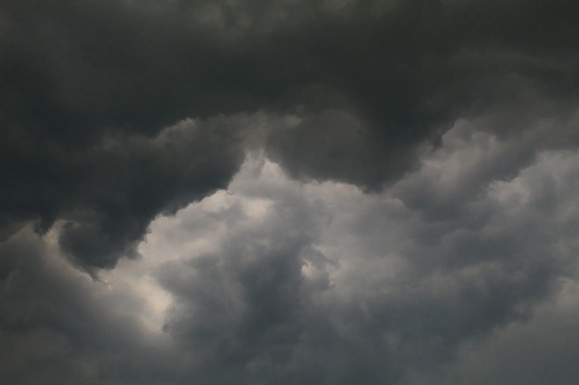 Heavy dark thunderclouds building overhead